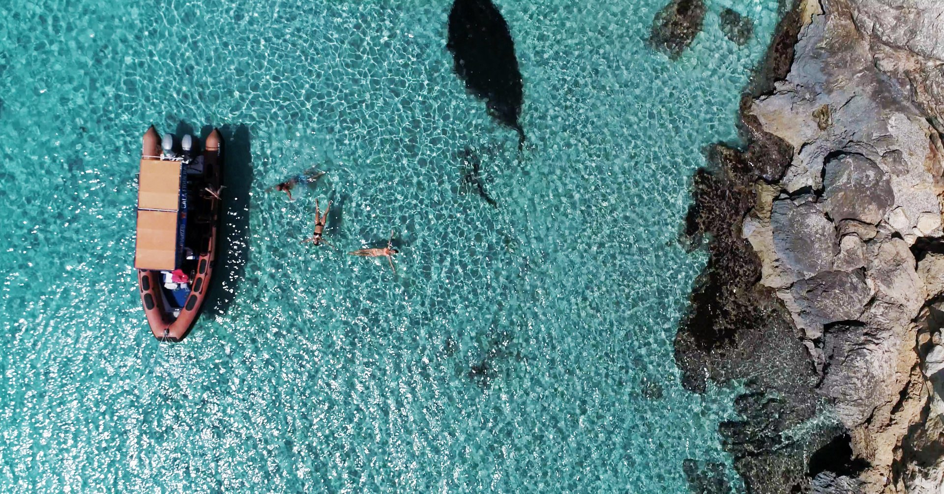 cala marmols by boat