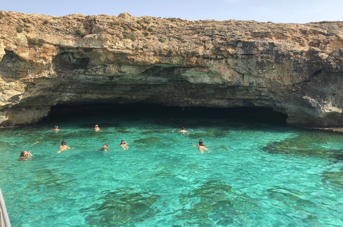 swimming stop at the blue cave in cabrera