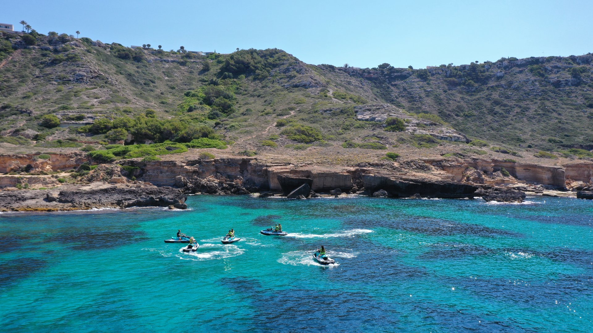 riding on the jet ski close to the coast