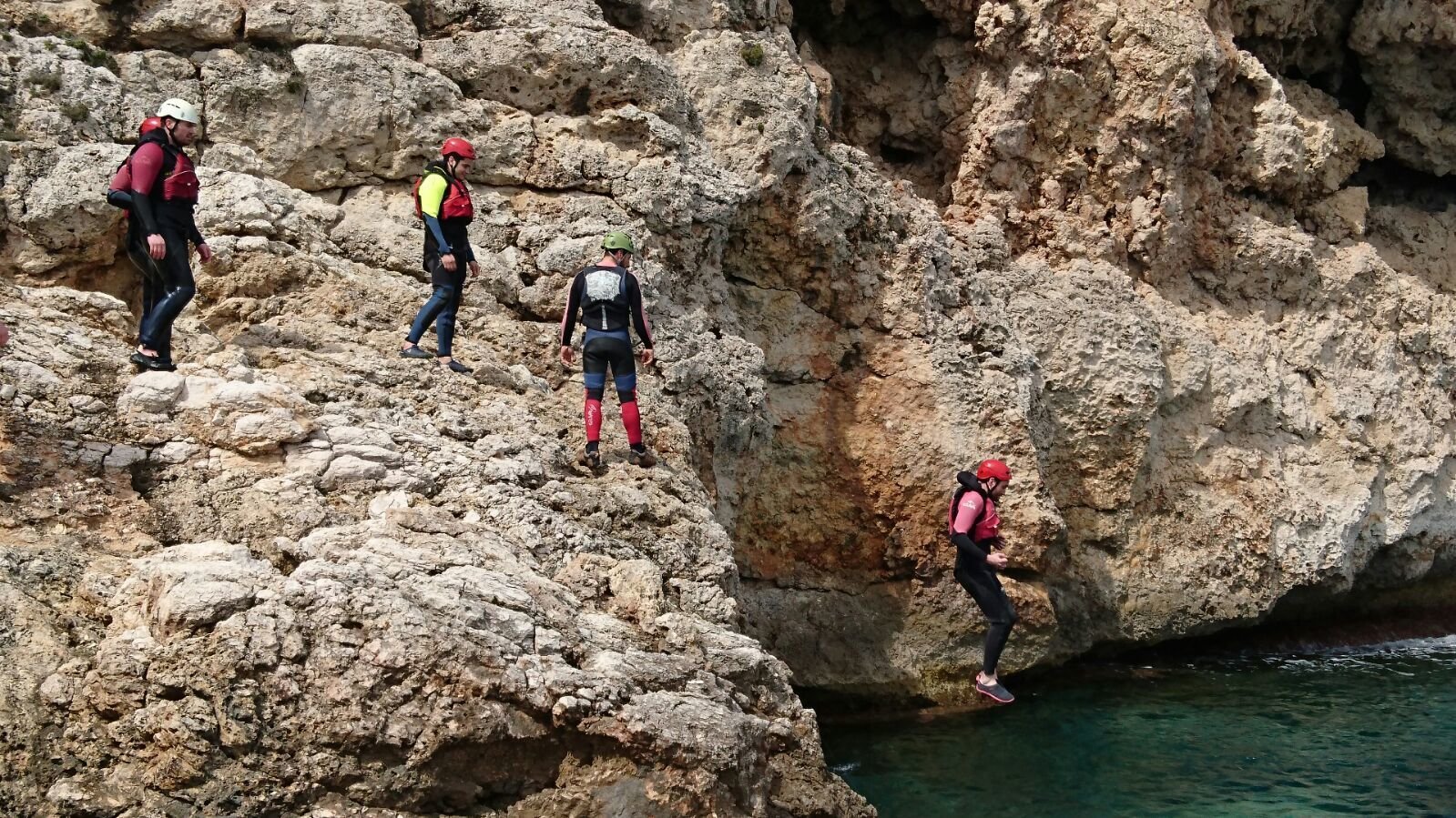 rappelling in coastering