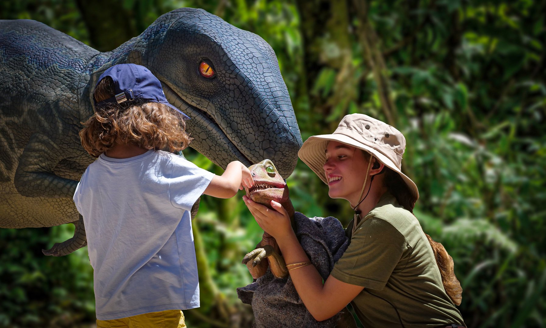child stroking the dinosaur