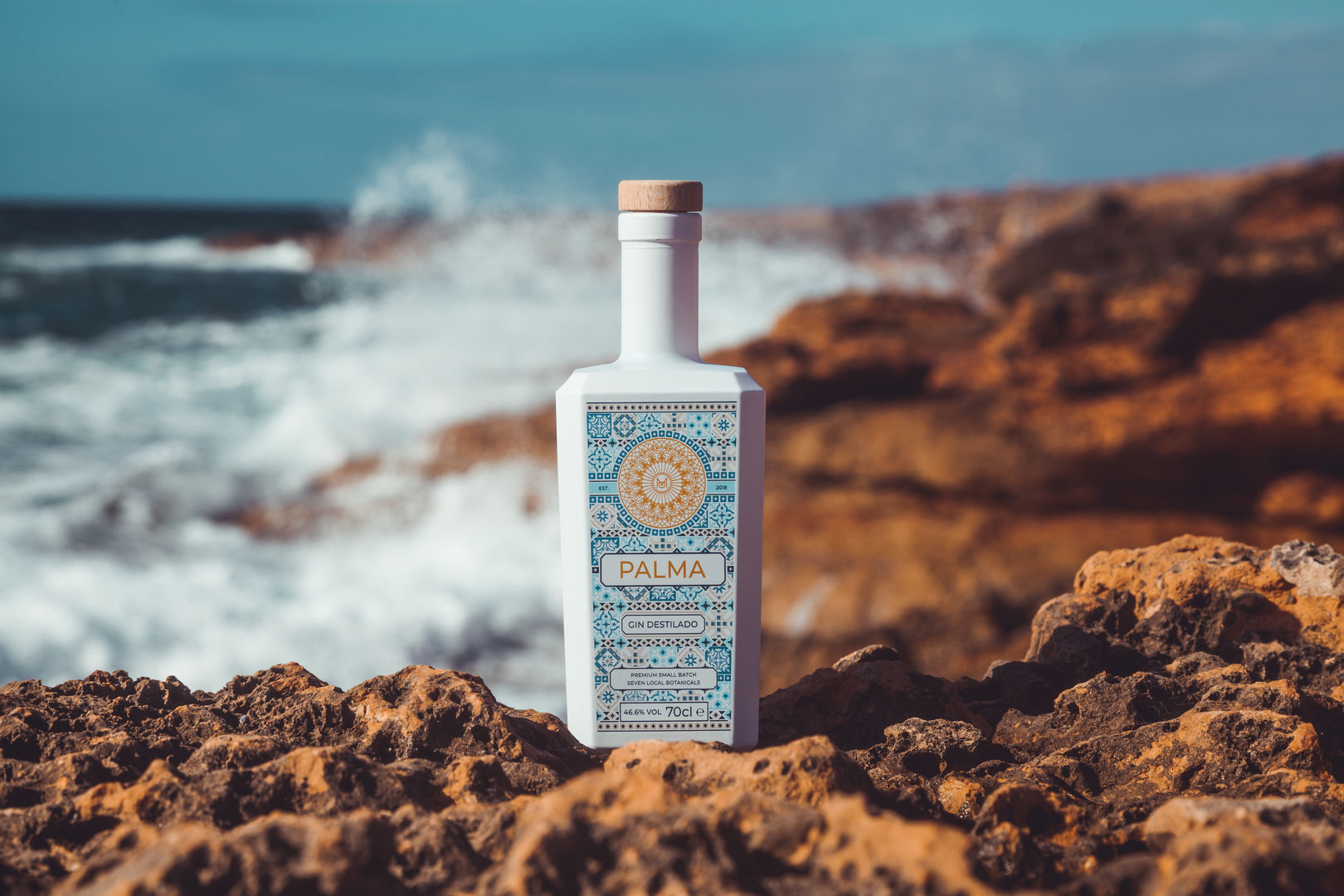 bottle of gin on Mallorca coast