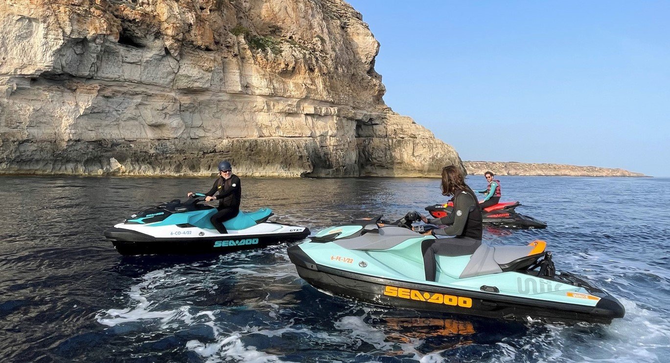 coastline with jet skis