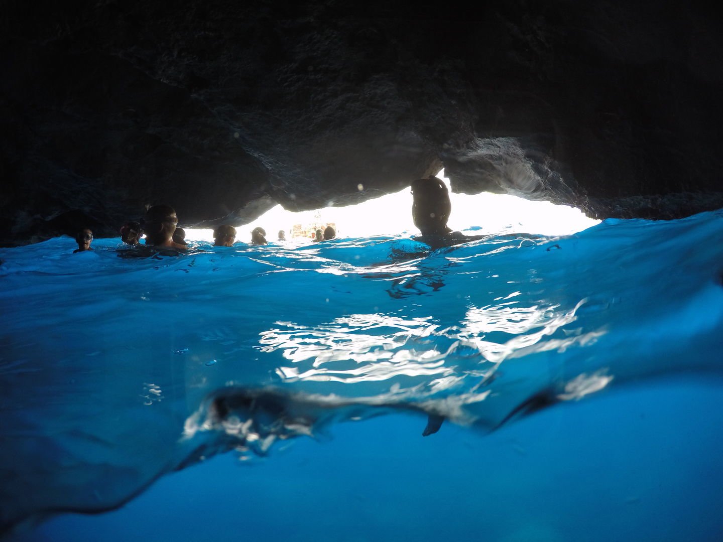 swimming stop at the blue cave during the tour